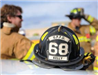 View of fireman's helmet with two firemen in back